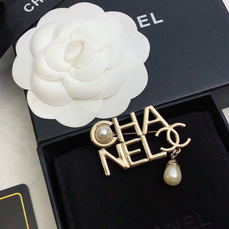 Ch*el brooches